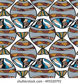 Seamless abstract hand-drawn ornamental fish with waves pattern. Doodle style.