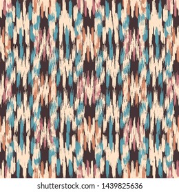 Seamless abstract ikat pattern with colorful strokes.
