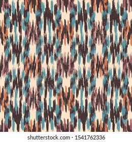 Seamless abstract ikat pattern with colorful strokes.
