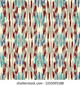 Seamless abstract ikat pattern with colorful strokes.
