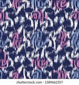 Seamless abstract ikat pattern with colorful strokes.
