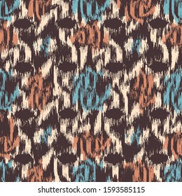 Seamless abstract ikat pattern with colorful strokes.

