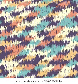 Seamless abstract ikat pattern with colorful strokes.
