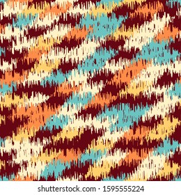Seamless abstract ikat pattern with colorful strokes.
