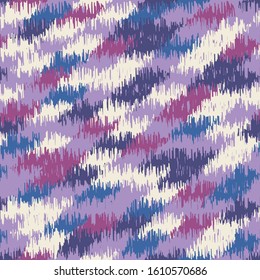 Seamless abstract ikat pattern with colorful strokes.
