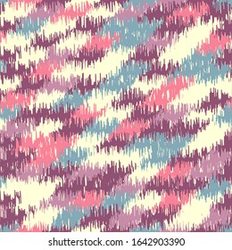 Seamless abstract ikat pattern with colorful strokes.
