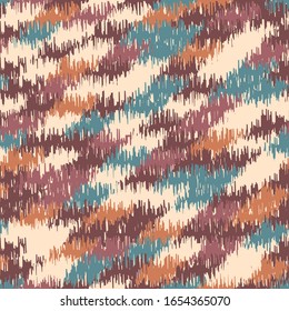 Seamless abstract ikat pattern with colorful strokes.
