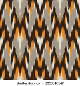 Seamless abstract ikat pattern in earthy color. Abstract background for textile design, wallpaper, surface textures, wrapping paper.