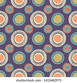 Seamless abstract ikat pattern with the image of circles.
