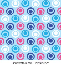 Seamless abstract ikat pattern with the image of rings and circles.
