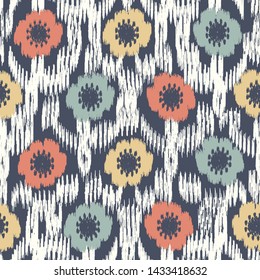 Seamless abstract ikat pattern with the image of floral ornament.
