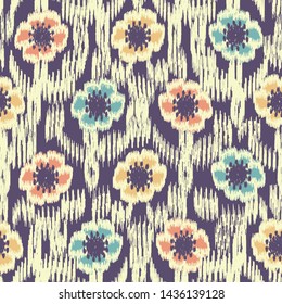 Seamless abstract ikat pattern with the image of floral ornament.
