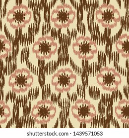 Seamless abstract ikat pattern with the image of floral ornament.
