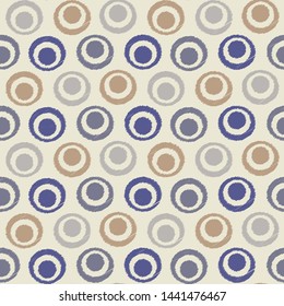 Seamless abstract ikat pattern with the image of rings and circles.
