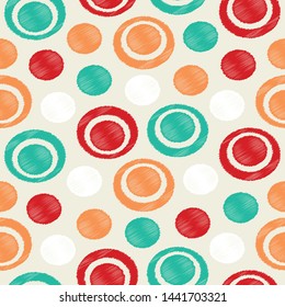 Seamless abstract ikat pattern with the image of rings and circles.
