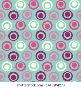 Seamless abstract ikat pattern with the image of rings and circles.
