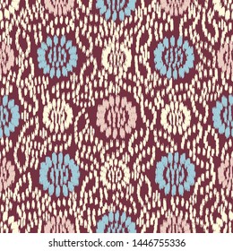 Seamless abstract ikat pattern with the image of floral ornament.
