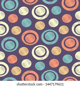 Seamless abstract ikat pattern with the image of rings and circles.
