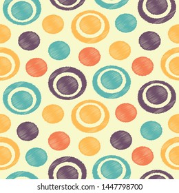 Seamless abstract ikat pattern with the image of rings and circles.
