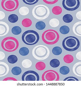 Seamless abstract ikat pattern with the image of rings and circles.
