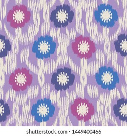 Seamless abstract ikat pattern with the image of floral ornament.
