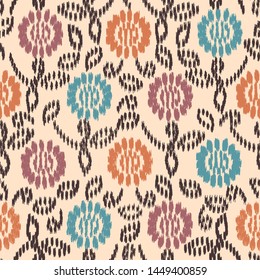 Seamless abstract ikat pattern with the image of floral ornament.
