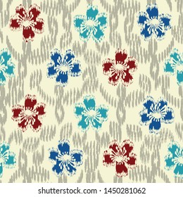Seamless abstract ikat pattern with the image of floral ornament.
