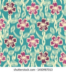 Seamless abstract ikat pattern with the image of floral ornament.
