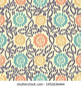 Seamless abstract ikat pattern with the image of floral ornament.
