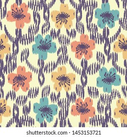 Seamless abstract ikat pattern with the image of floral ornament.
