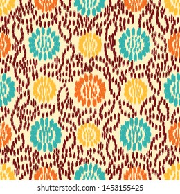 Seamless abstract ikat pattern with the image of floral ornament.
