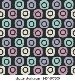 Seamless abstract ikat pattern with the image of oval geometric shapes
