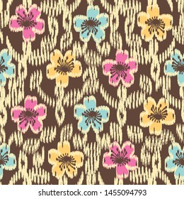 Seamless abstract ikat pattern with the image of floral ornament.
