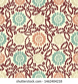 Seamless abstract ikat pattern with the image of floral ornament.
