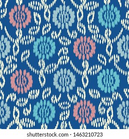 Seamless abstract ikat pattern with the image of floral ornament.
