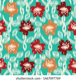 Seamless abstract ikat pattern with the image of floral ornament.
