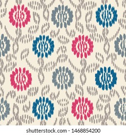 Seamless abstract ikat pattern with the image of floral ornament.
