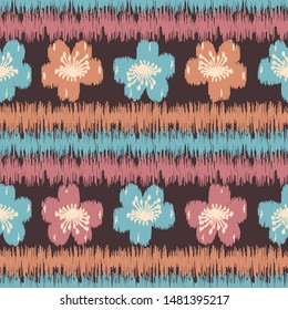 Seamless abstract ikat pattern with the image of floral ornament.
