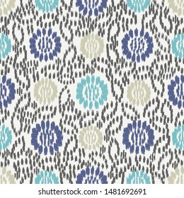Seamless abstract ikat pattern with the image of floral ornament.

