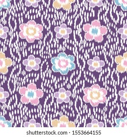 Seamless abstract ikat pattern with the image of floral ornament.

