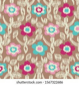 Seamless abstract ikat pattern with the image of floral ornament.
