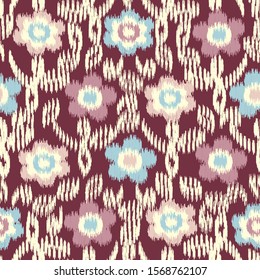 Seamless abstract ikat pattern with the image of floral ornament.
