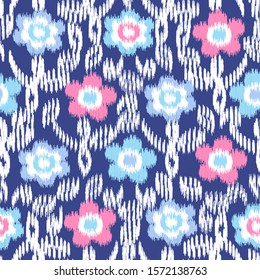 Seamless abstract ikat pattern with the image of floral ornament.

