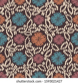 Seamless abstract ikat pattern with the image of floral ornament.
