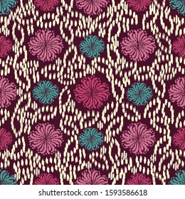 Seamless abstract ikat pattern with the image of floral ornament.
