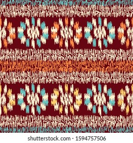 Seamless abstract ikat pattern with the image of floral ornament.
