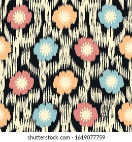 Seamless abstract ikat pattern with the image of floral ornament.
