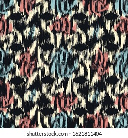 Seamless abstract ikat pattern with the image of floral ornament.
