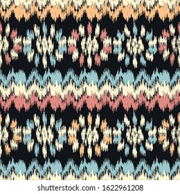 Seamless abstract ikat pattern with the image of floral ornament.
