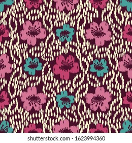 Seamless abstract ikat pattern with the image of floral ornament.
